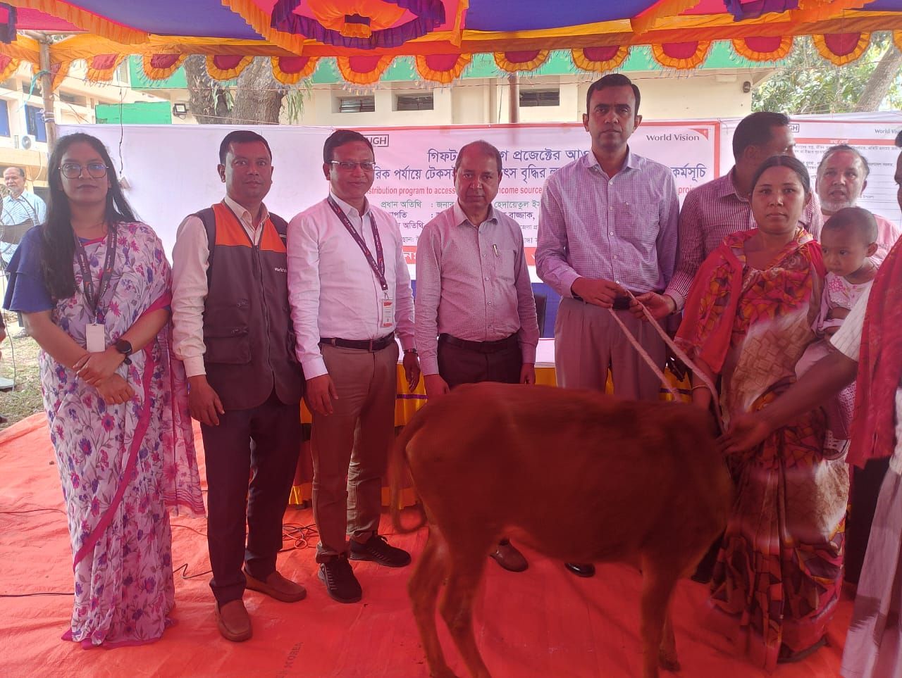 Cow distribute among ultra-poor families.jpeg